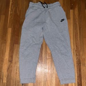 Grey Nike tech joggers. Boys large worn twice. Smoke free pet free